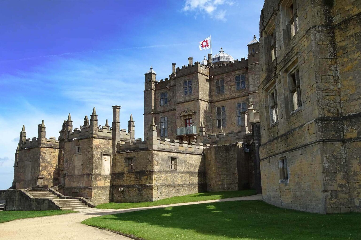 Bolsover Castle, a grand historic palace with towers and fortified walls.